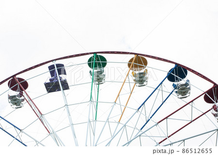 Ferris wheel in an amusement park Ferris wheel in an amusement park 86512655