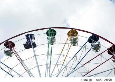 Ferris wheel in an amusement park Ferris wheel in an amusement park 86512656