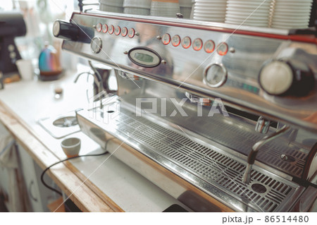 Close up of coffee machine control panel Close up of coffee machine control panel 86514480