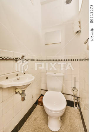 Interior of small clean restroom in miniature style Interior of small clean restroom in miniature style 86515278