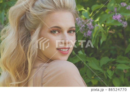 Beautiful female face close up outdoor Beautiful female face close up outdoor 86524770