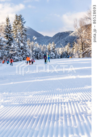 Groomed ski run and mountains, Bansko, Bulgaria Groomed ski run and mountains, Bansko, Bulgaria 86528693