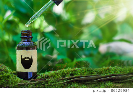 Beard Oil - barbershop product photography. Bottle and blank space. 86529984