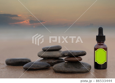 Fitotherapy, bottle on the sand.. Fitotherapy, bottle on the sand.. 86533444