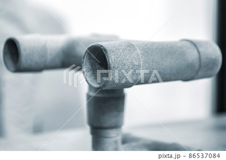 Gray object detail printed on powder industrial 3D printer. Three-dimensional 86537084