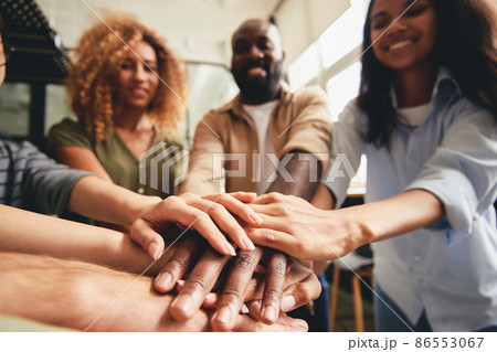 People of different ethnicities uniting to cooperate together People of different ethnicities uniting to cooperate together 86553067