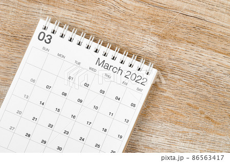 March 2022 desk calendar on wooden background. March 2022 desk calendar on wooden background. 86563417
