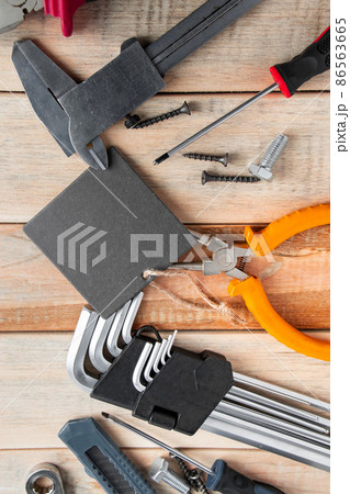 Set of work tools on a wooden background. Festive greeting card concept for Father's day 86563665