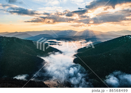 authentic dawn in the Carpathians, Synevyrska Polyana National Park. authentic dawn in the Carpathians, Synevyrska Polyana National Park. 86568499