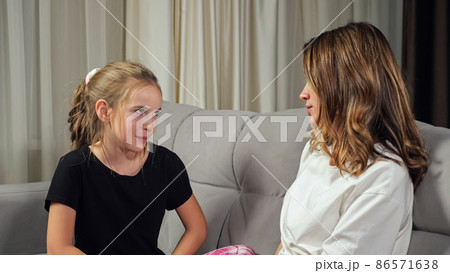 Mother scolds teen daughter for disobedience at home 86571638