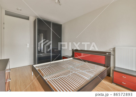 Beautiful bedroom in new luxury home with some decor 86572893