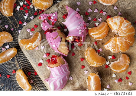 doughnuts with berry filling and chocolate doughnuts with berry filling and chocolate 86573332