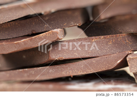 chocolate is broken into a large number of pieces 86573354