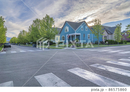 Crosswalks on the intersection in a residential area at Daybreak, Utah Crosswalks on the intersection in a residential area at Daybreak, Utah 86575860