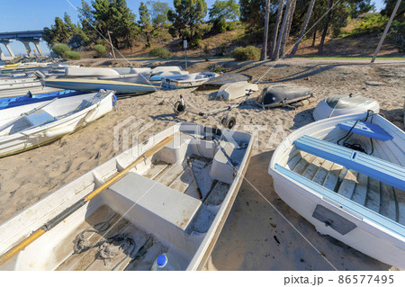 Boats on a sandy shore at Coronado, San Diego, California 86577495