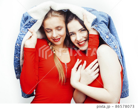 best friends teenage girls together having fun, posing emotional on white background, besties happy smiling, lifestyle people concept best friends teenage girls together having fun, posing emotional on white background, besties happy smiling, lifestyle people concept 86578073