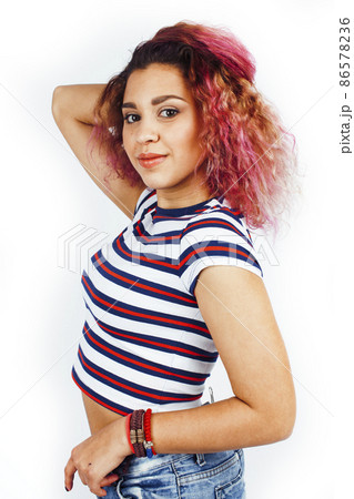 young happy smiling latin american teenage girl emotional posing on white background, lifestyle people concept young happy smiling latin american teenage girl emotional posing on white background, lifestyle people concept 86578236