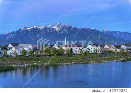 Oquirrh Lake with a reflection of the dusk sky at Daybreak, Utah 86579072