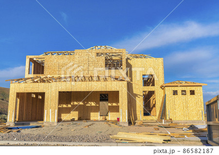 Unfinished house structure with timber frame and cork wall insulation 86582187