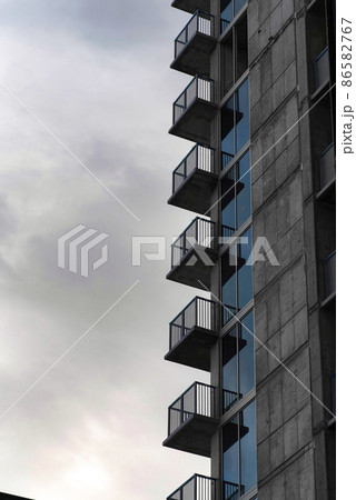 Side of a tall building with railings on the balconies at Salt Lake City, Utah 86582767