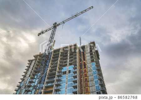 Low angle view of an unfinished building with tower cranes at Salt Lake City in Utah Low angle view of an unfinished building with tower cranes at Salt Lake City in Utah 86582768