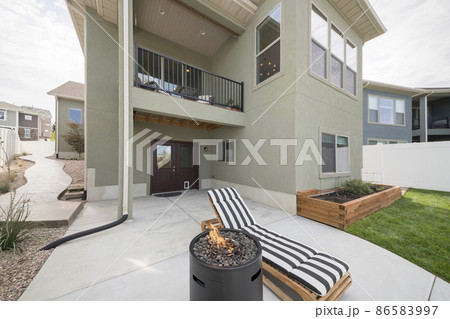 Modern light green two-storey house exterior with terrace Modern light green two-storey house exterior with terrace 86583997