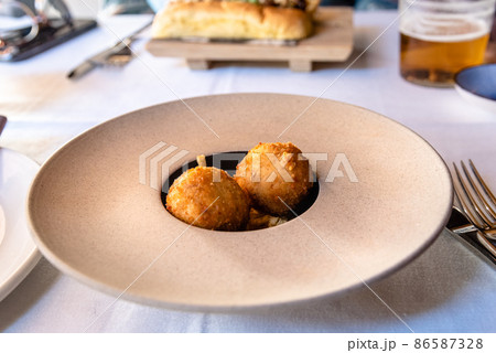 Delicious meal of Spanish fusion cuisine, beautiful dish 86587328