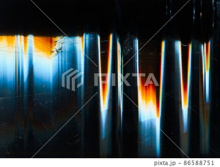 Broken screen texture. Color glitch overlay. Cracked monitor. Blue orange white red glow artifacts dust scratch digital noise on dark black filter. Broken screen texture. Color glitch overlay. Cracked monitor. Blue orange white red glow artifacts dust scratch digital noise on dark black filter. 86588751