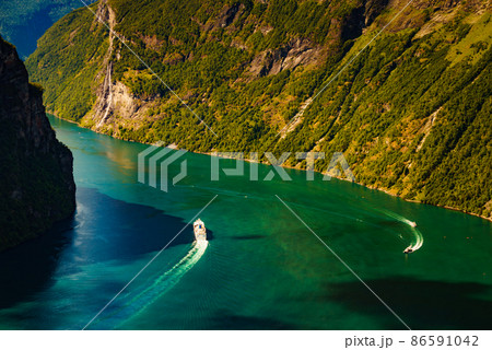 Fjord Geirangerfjord with cruise ship, Norway. 86591042