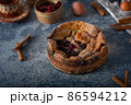 Breaded rustic pie with berries 86594212