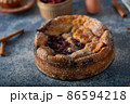 Breaded rustic pie with berries 86594218