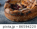 Breaded rustic pie with berries 86594220