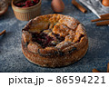 Breaded rustic pie with berries 86594221