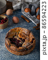 Breaded rustic pie with berries 86594223