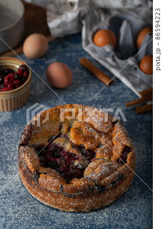 Breaded rustic pie with berries 86594223