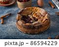 Breaded rustic pie with berries 86594229