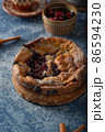 Breaded rustic pie with berries 86594230
