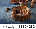 Breaded rustic pie with berries 86594232