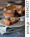 Breaded rustic pie with berries 86594237