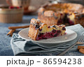 Breaded rustic pie with berries 86594238