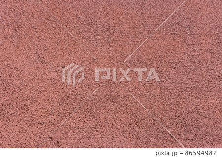 Rough painted brown stone wall surface texture background 86594987
