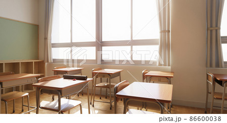 爽やかな光が差し込む学校の教室 / 机に置かれた卒業証書と赤いコサージュ / 卒業と旅立ちのイメージ 86600038