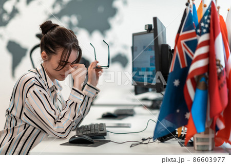 Beautiful Shocked and Annoyed Young Woman Looking her Laptop. Sad Operator Agent Woman Working from Home in a Call Center Beautiful Shocked and Annoyed Young Woman Looking her Laptop. Sad Operator Agent Woman Working from Home in a Call Center 86603977