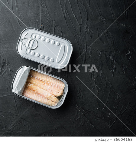 Canned Mackerel Fillets in Tin, in tin can, on black background, top view flat lay, with copyspace and space for text, square format Canned Mackerel Fillets in Tin, in tin can, on black background, top view flat lay, with copyspace and space for text, square format 86604168