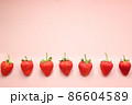 Rows of red strawberries with copy space 86604589