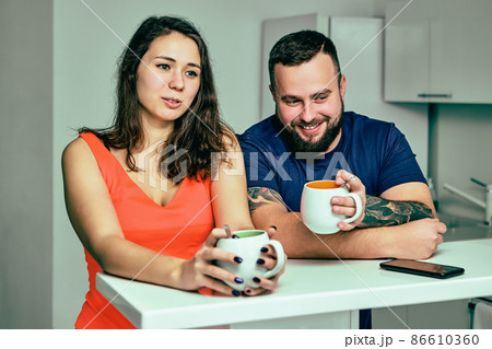 Employees are talking during coffee break in office. Employees are talking during coffee break in office. 86610360