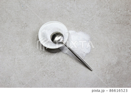Collagen powder on grey background. Natural health supplement for skin 86616523
