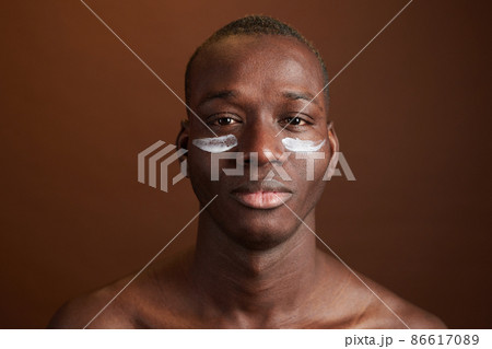 Man caring about the skin on his face Man caring about the skin on his face 86617089