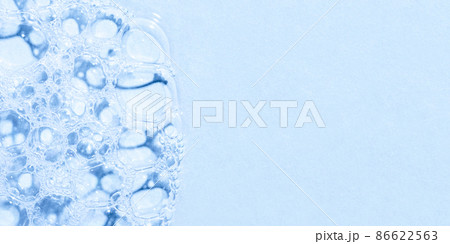Texture of soap, shower gel or shampoo foam. The image is tinted in blue. Texture of soap, shower gel or shampoo foam. The image is tinted in blue. 86622563