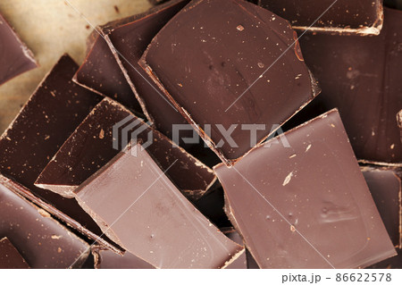 a chocolate bar broken into more pieces 86622578